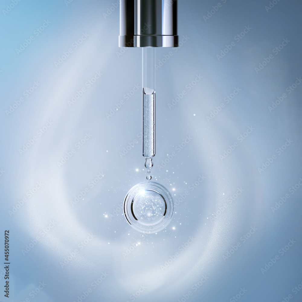 Cosmetic pipette with Cosmetic Essence, Liquid drop on blue background Cosmetic pipette with Cosmetic Essence, Liquid drop on blue background