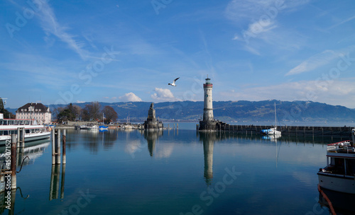 the beautiful harbour of Lindau island on lake Constance in Germany on a sunny day in March © Julia