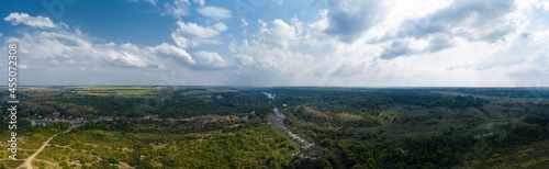 Landscape of the river and granite rocks aerial panorama view. Radon Lake in Migiya Ukraine