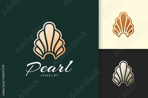 Luxury pearl or clam logo represent jewelry or gem fit for beauty care or cosmetic brand