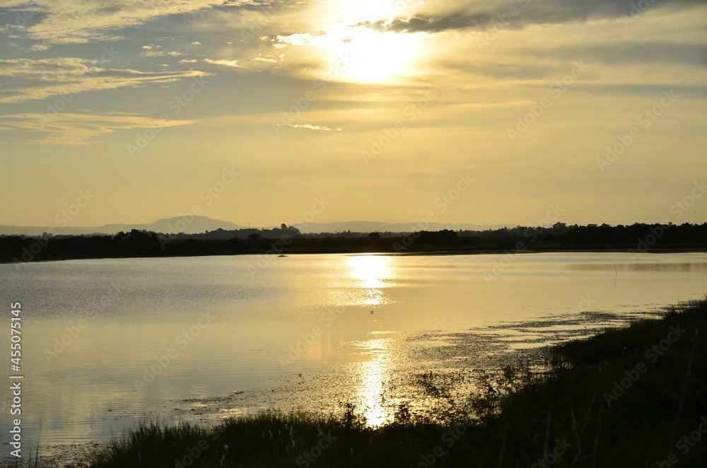 Fototapeta premium sunset over the river