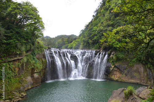 Shifen is well known for the Shifen Waterfall  a 40 metre tall waterfall that creates a rainbow as it splashes into the lake  widely regarded as the most scenic in all of Taiwan.