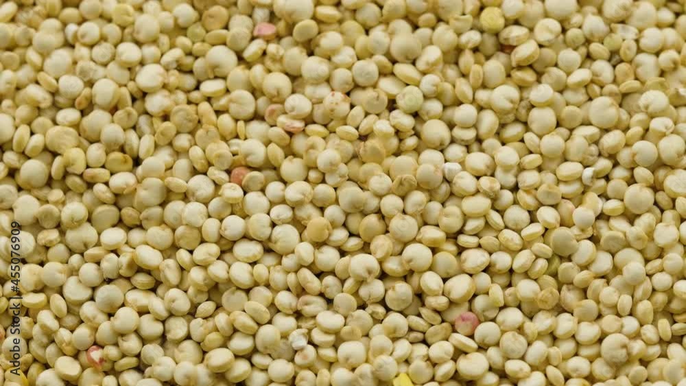 Raw superfood quinoa seeds, rotating macro shot Raw superfood quinoa seeds, rotating macro shot