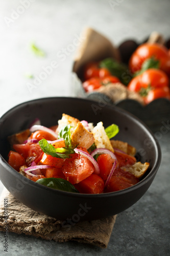Traditional Italian panzanella salad with tomato and bread