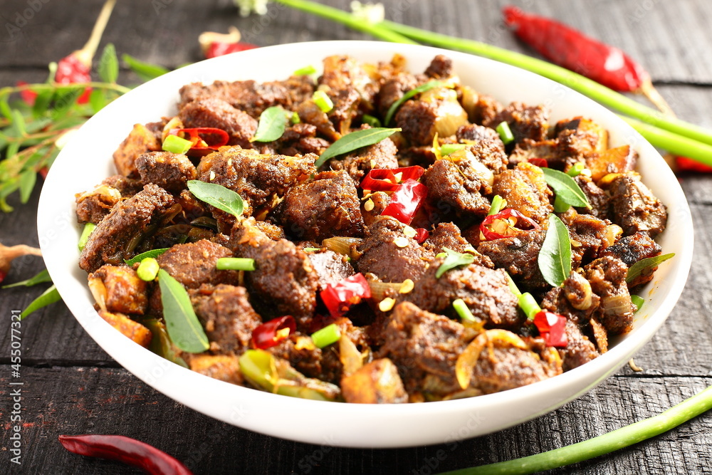 Homemade meat fry with spices, traditional Indian recipes. Homemade meat fry with spices, traditional Indian recipes.