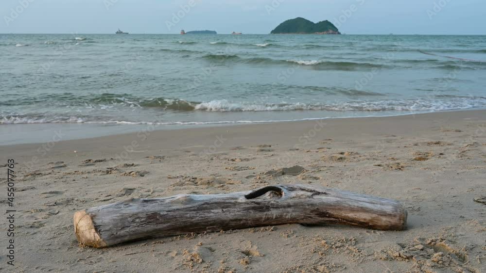 Old timber on sea beach wave breaking lt seems to raging with anger and calm down lt's natural with sea sky background. Old timber on sea beach wave breaking lt seems to raging with anger and calm down lt's natural with sea sky background.