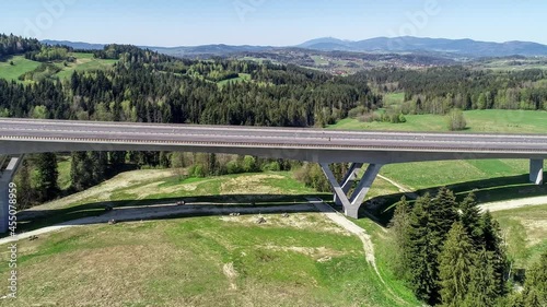 New highway in Poland on national road no 7, E77, called Zakopianka near  Skomielna  Biała village. Aerial 4K panning video photo