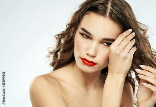 pretty woman bare shoulders luxury light background