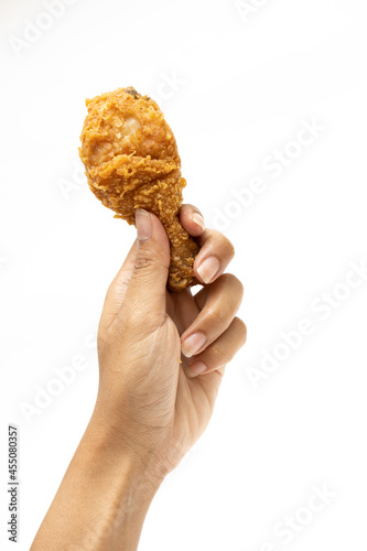Hand hold fried calf chicken isolated on white background