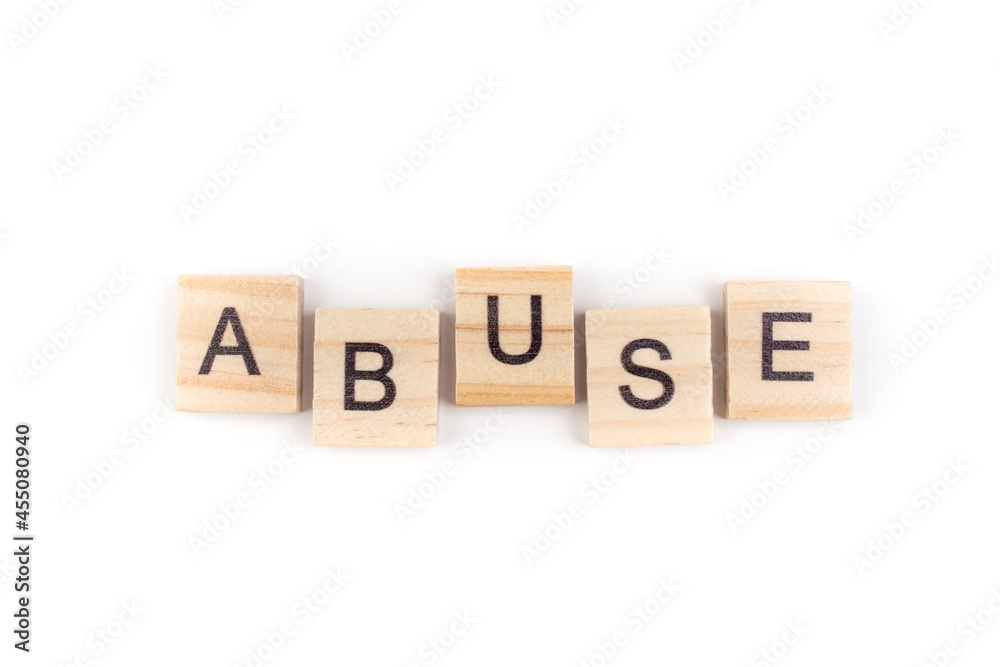 Abuse- word composed fromwooden blocks letters on White background, copy space for ad text. Abuse- word composed fromwooden blocks letters on White background, copy space for ad text.