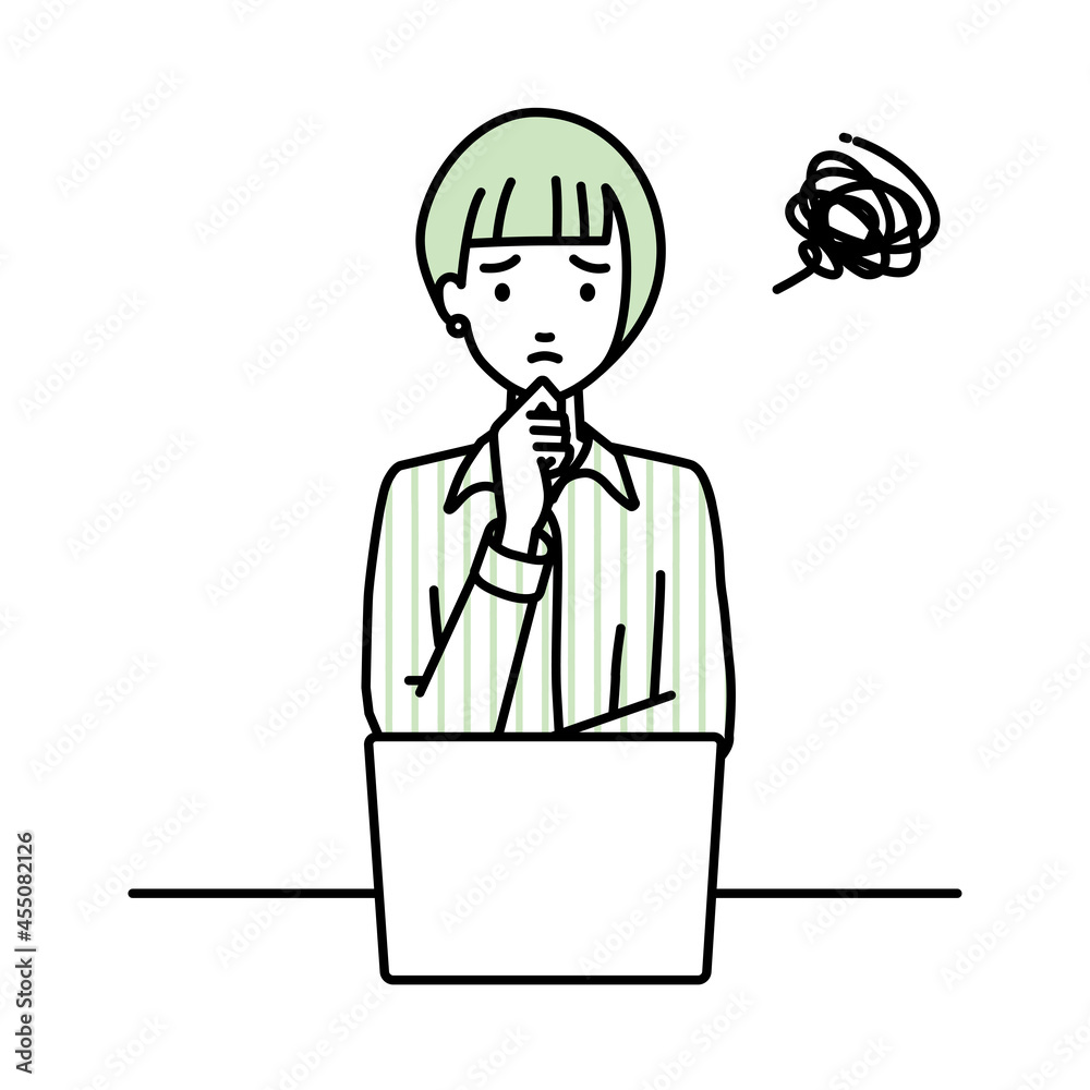 デスクで座ってPCを開いて困っているブラウスの女性 デスクで座ってPCを開いて困っているブラウスの女性