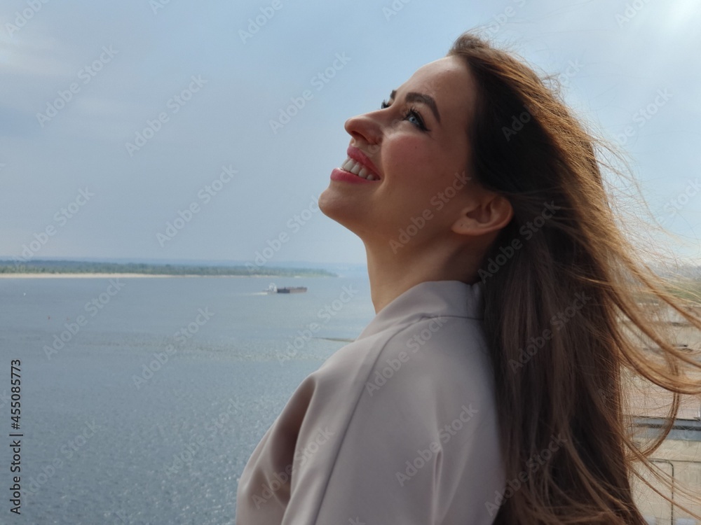 Young beautiful woman on the roof. Volgograd