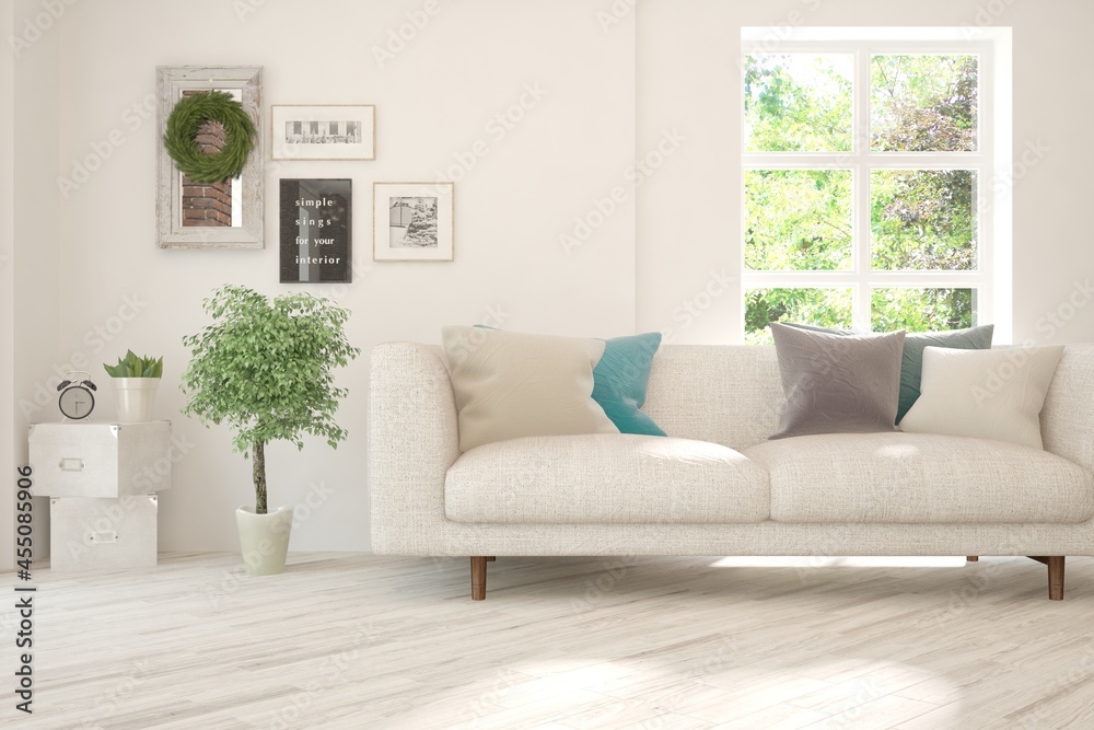 Fototapeta premium White living room with sofa and summer landscape in window. Scandinavian interior design. 3D illustration