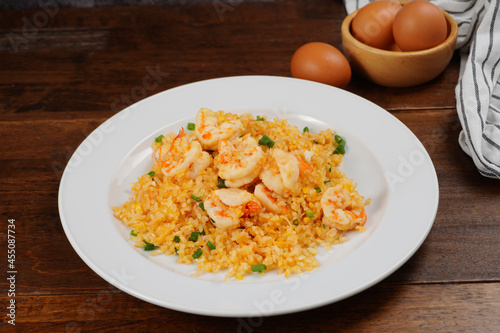 Shrimp fried rice and homemade food egg on a white plate
