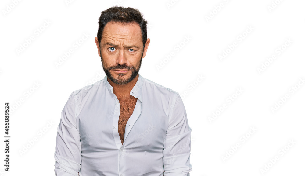 Middle age man wearing casual clothes depressed and worry for distress, crying angry and afraid. sad expression. Middle age man wearing casual clothes depressed and worry for distress, crying angry and afraid. sad expression.