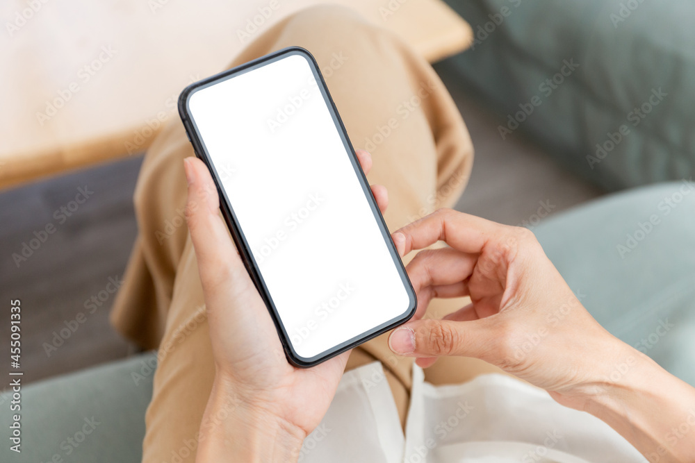cell phone blank white screen mockup.woman hand holding texting using mobile on desk at office.background empty space for advertise.work people contact marketing business,technology cell phone blank white screen mockup.woman hand holding texting using mobile on desk at office.background empty space for advertise.work people contact marketing business,technology