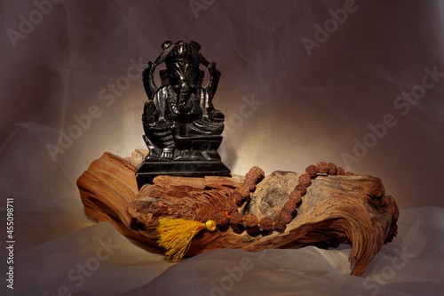 The Indian god Lord Ganesha. Composition with the image of the Hindu deity of religio photo