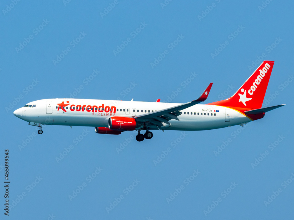 A Boeing 737-800 of the low-cost airline Corendon Airlines with the  identification number 9H-TJB approaching for landing at Heraklion airport  on the Greek island of Crete Stock Photo | Adobe Stock