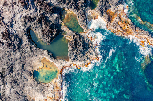 Bild auf Leinwand Aerial view Natural pool by the ocean, Mosteiros, Sao Miguel