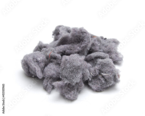 Laundry lint from the dryer on white photo