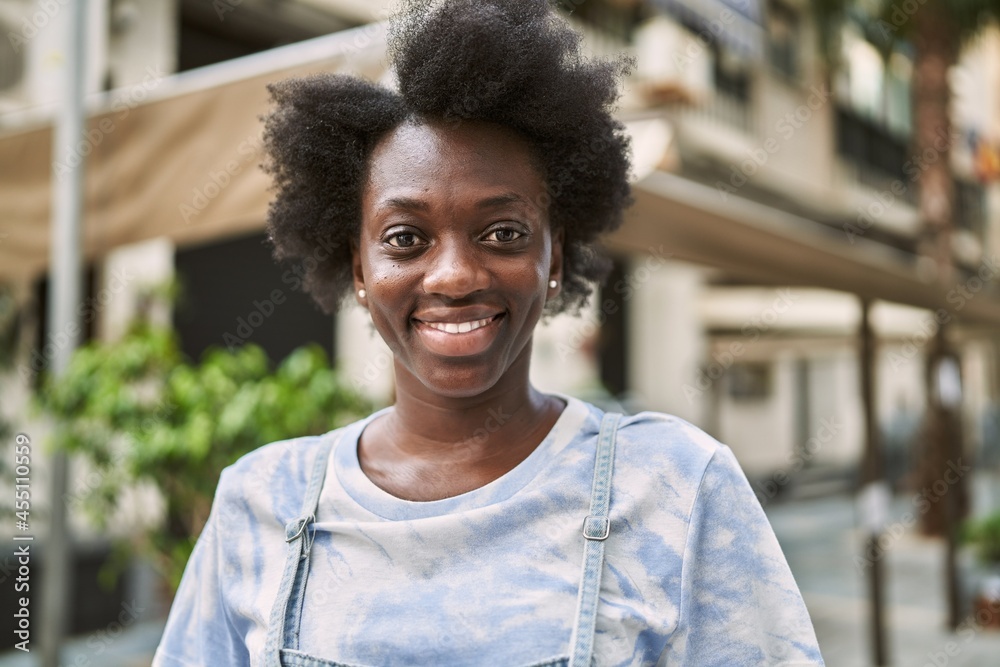 Young african woman smiling confident at street Young african woman smiling confident at street