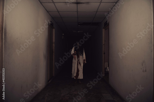 Portrait of asian woman make up ghost Scary horror scene for background Halloween festival concept Ghost movies poster angry spirit in the apartment