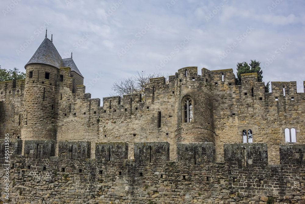 Medieval citadel at Carcassonne - huge and completely over-the-top, encompassing no less than 53 towers, enormous concentric walls, surrounded by a moat. Aude department, region of Occitanie, France.