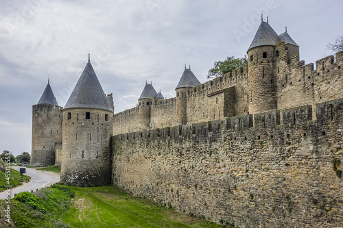Medieval citadel at Carcassonne - huge and completely over-the-top, encompassing no less than 53 towers, enormous concentric walls, surrounded by a moat. Aude department, region of Occitanie, France.