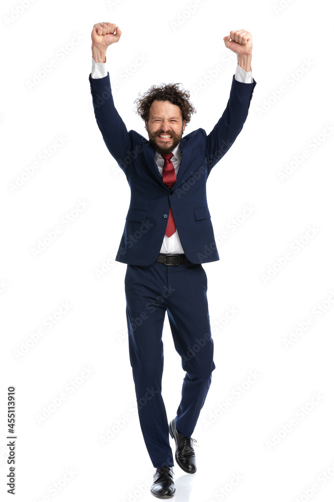 excited businessman walking towards the camera excited businessman walking towards the camera