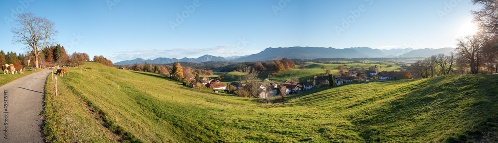 idyllic hiking trail above Aidling village, panoramic view alpine foothills bavaria in autumn