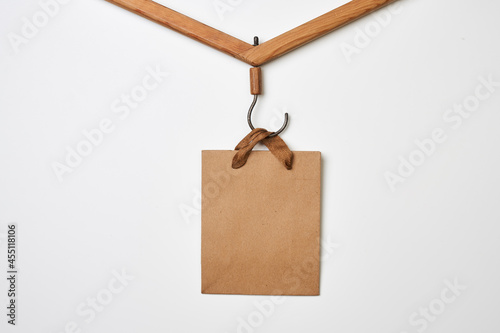 Black friday concept. Shopping bag on cloth holder on white background