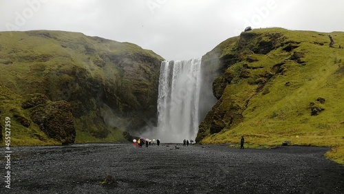 Skogafoss waterfall in cloudy weather, Iceland.