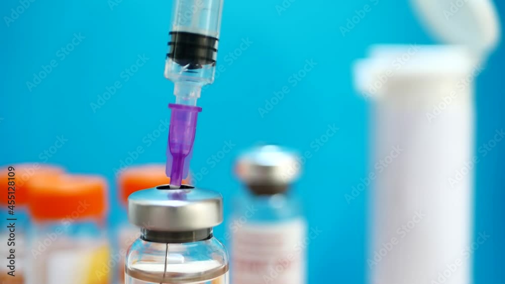 holding syringe and medicine vial prepare for injection with surgicale holding syringe and medicine vial prepare for injection with surgicale