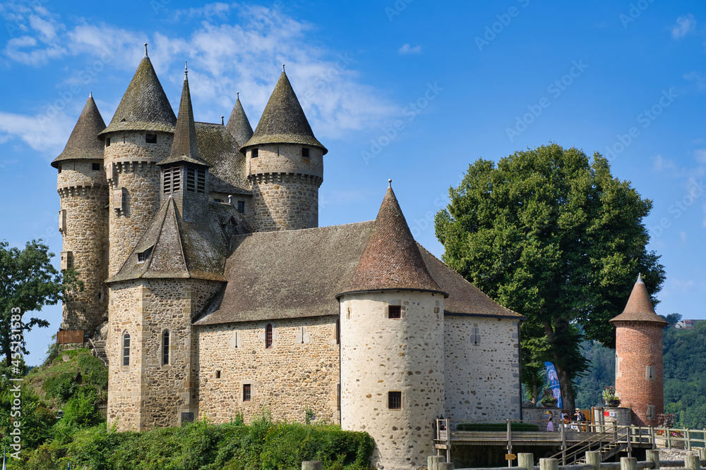 View (august 2021) of a french fortified castle,  along dordogne river, Auvergne, Cantal, France