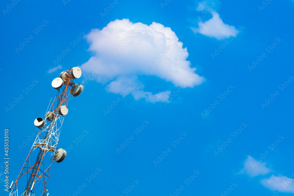 Antenna with many receiver dishes and sky and clouds background. Antenna with many receiver dishes and sky and clouds background.