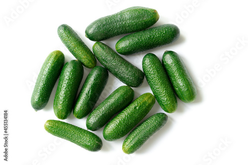 green fresh cucumbers isolated on white background