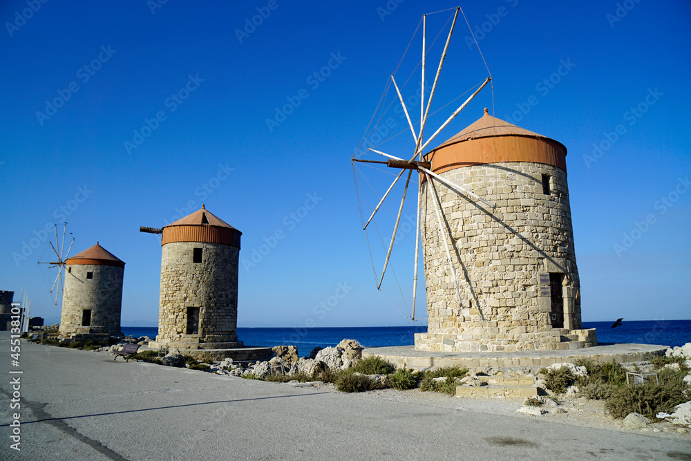 famous windmills at madraki harbor