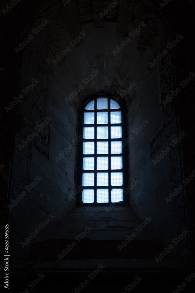 Backlit window in Castel del Monte (Italy)
