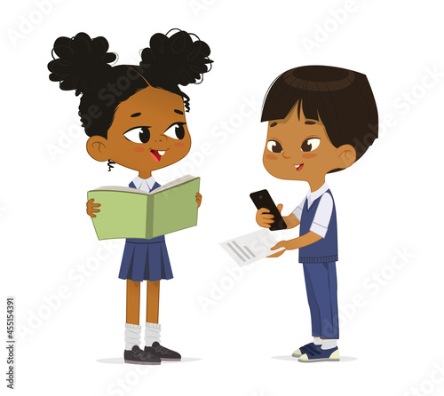 Cute multiracial primary pupils talking together carrying book, smartphone and paper sheet with task vector flat illustration. Funny schoolgirl and schoolboy communicating in trendy school uniform