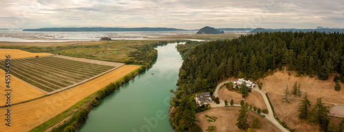 Aerial View of Skagit River Delta. Environmental groups are leading an innovative effort to restore highly productive tidal marshes that is critical habitat for threatened salmon in Washington state. photo