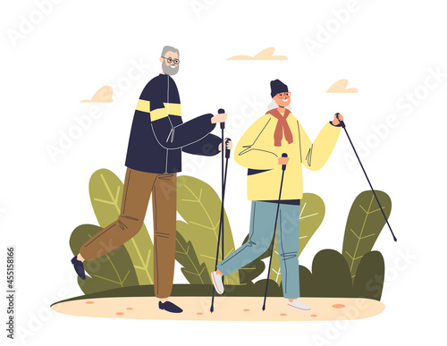 Active senior man and woman nordic walking with sticks in park. Older couple of walkers tracking