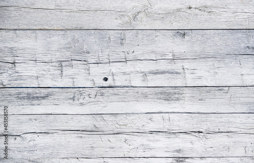Fototapeta Naklejka Na Ścianę i Meble -  White painted chipped wood texture with flat wooden boards background