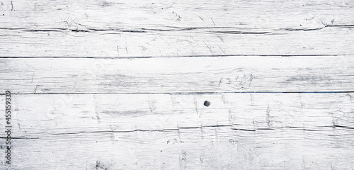 Fototapeta Naklejka Na Ścianę i Meble -  White painted chipped wood texture with flat wooden boards background
