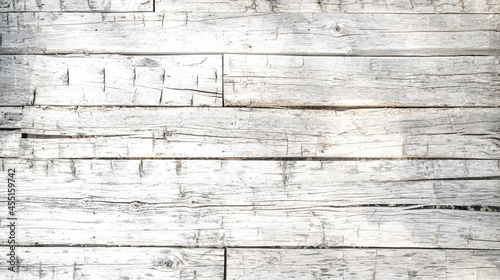 White painted chipped wood texture with flat wooden boards background 