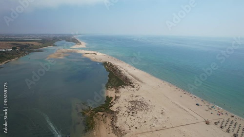 Aerial view of Praia da Fabrica, also known as Praia de Cacela Velha beach, a sandy barrier island at the mouth of the Ria Formosa in the Algarve region of mainland Portugal