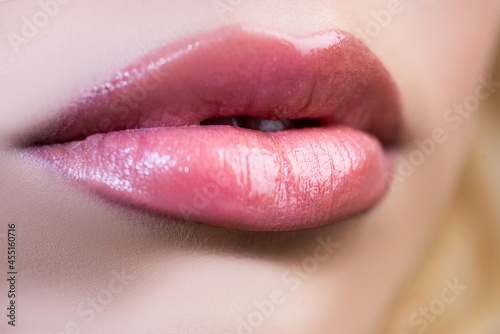 Lips close up. Cosmetics make up advertising. Beautiful female perfect red lips.
