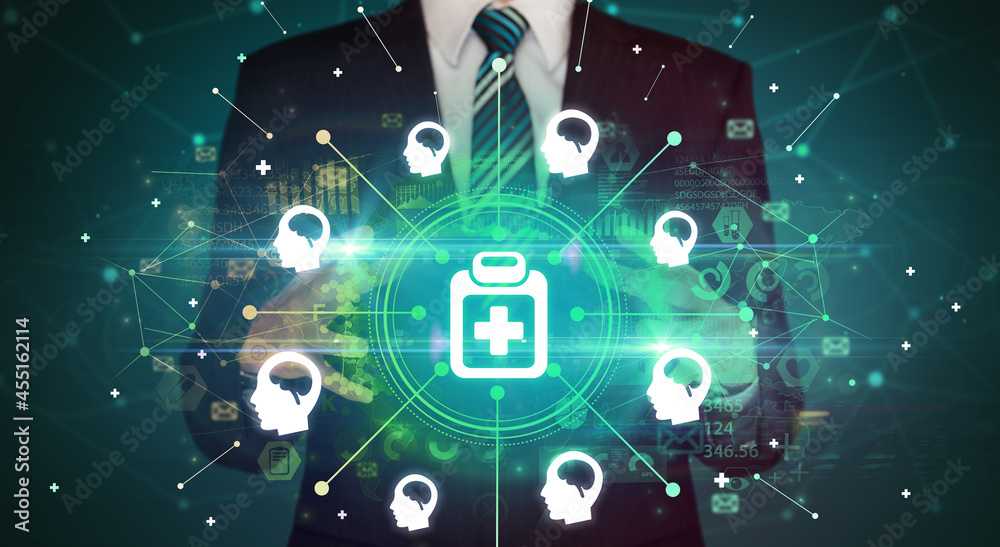 Fototapeta premium Hand holding healthcare icons concept