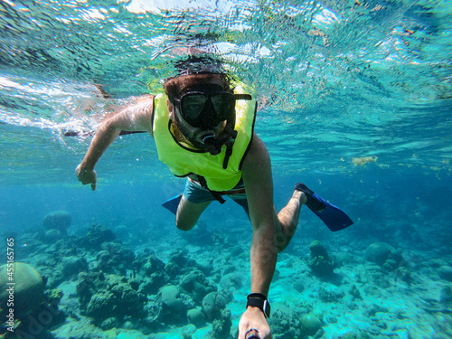 Man Snorkeling Underwater at Buck Island in St. Croix