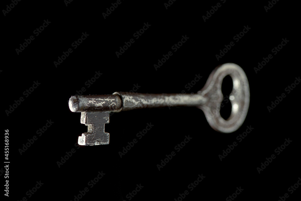 Skeleton key antique, selective focus, isolated on black Skeleton key antique, selective focus, isolated on black