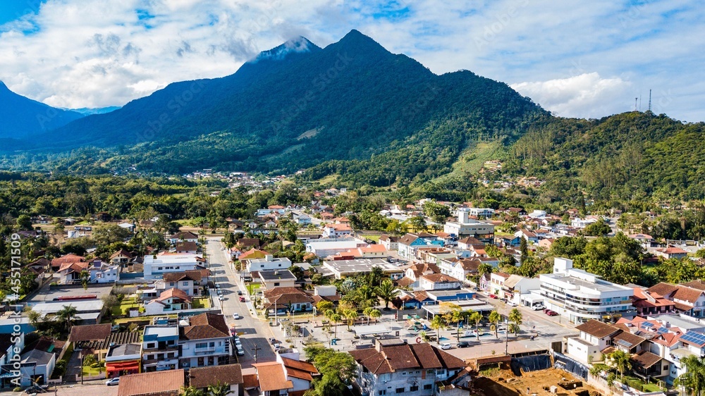 Corupá, SC - Aerial view of the city of Corupá with the mountains in the background